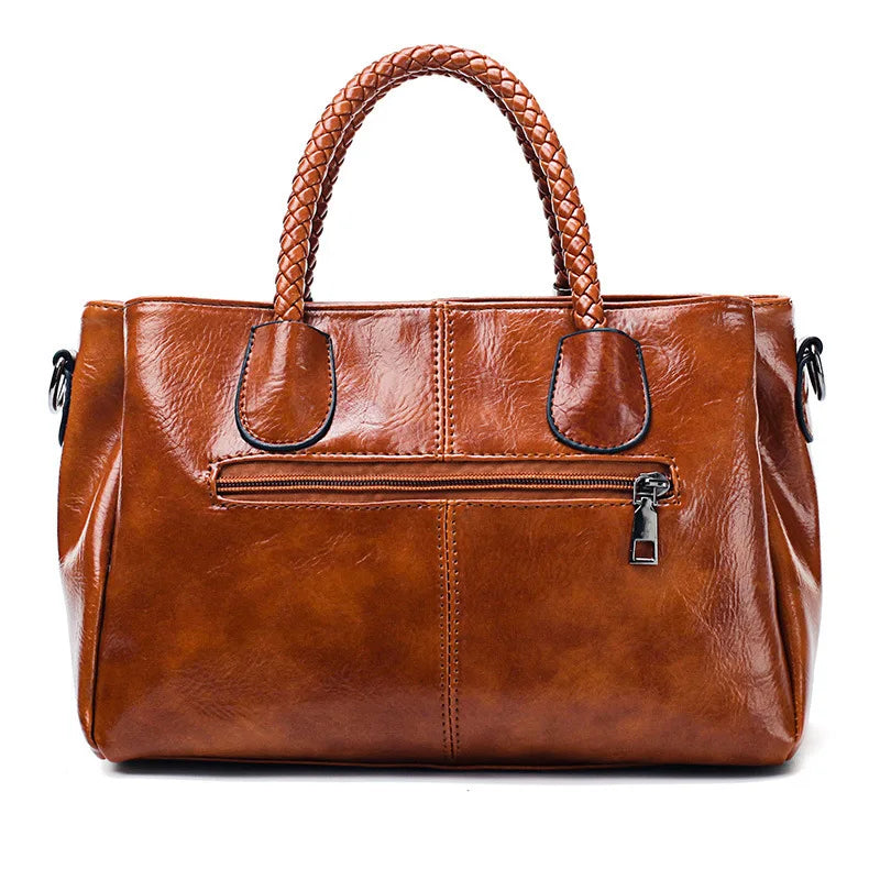 Pia™ | Sac à dos en cuir élégant avec poignées tressées