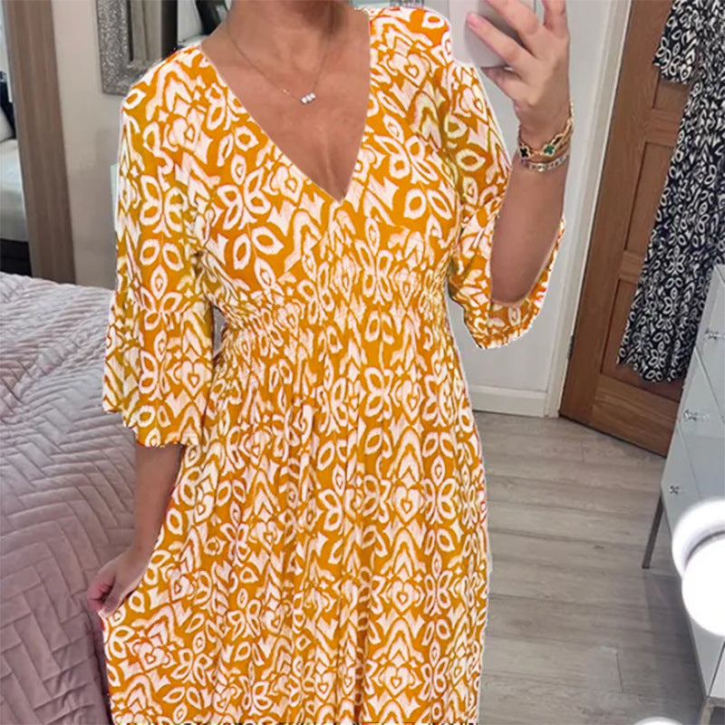 Zlata | Robe stylisée avec motif floral et décolleté en V