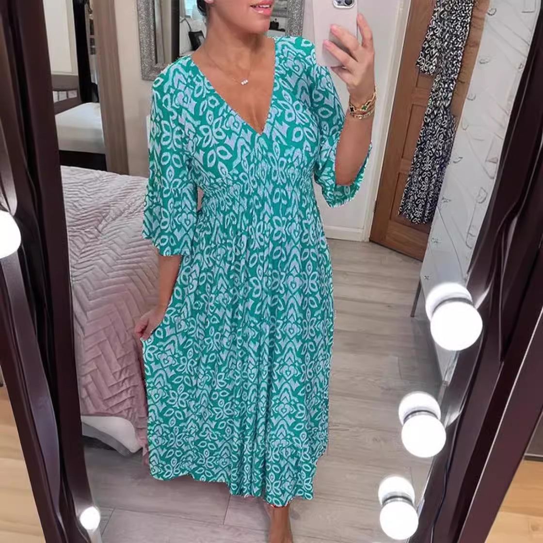 Zlata | Robe stylisée avec motif floral et décolleté en V